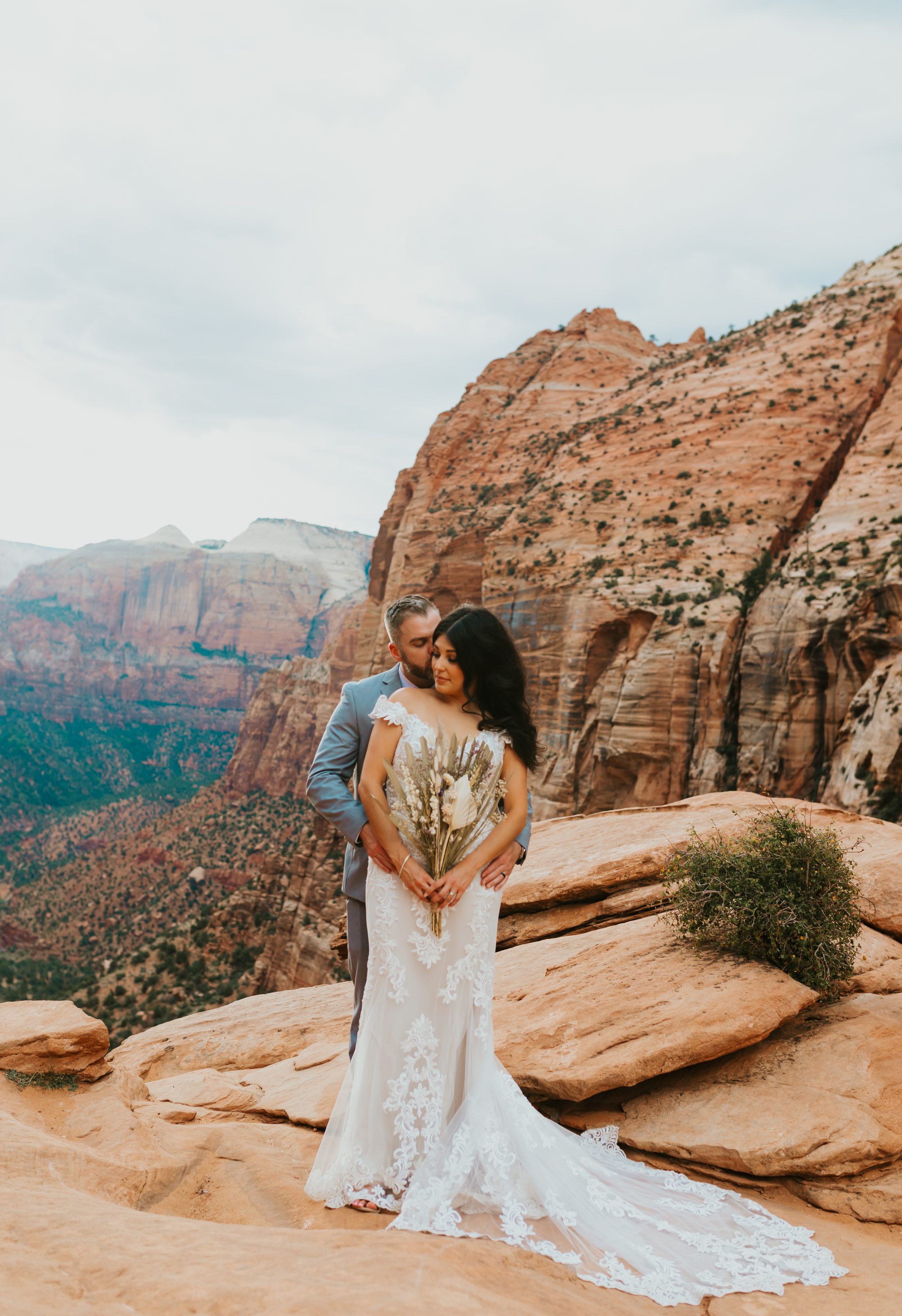 Couple elopement portrait Zion canyon red rock Southern Utah