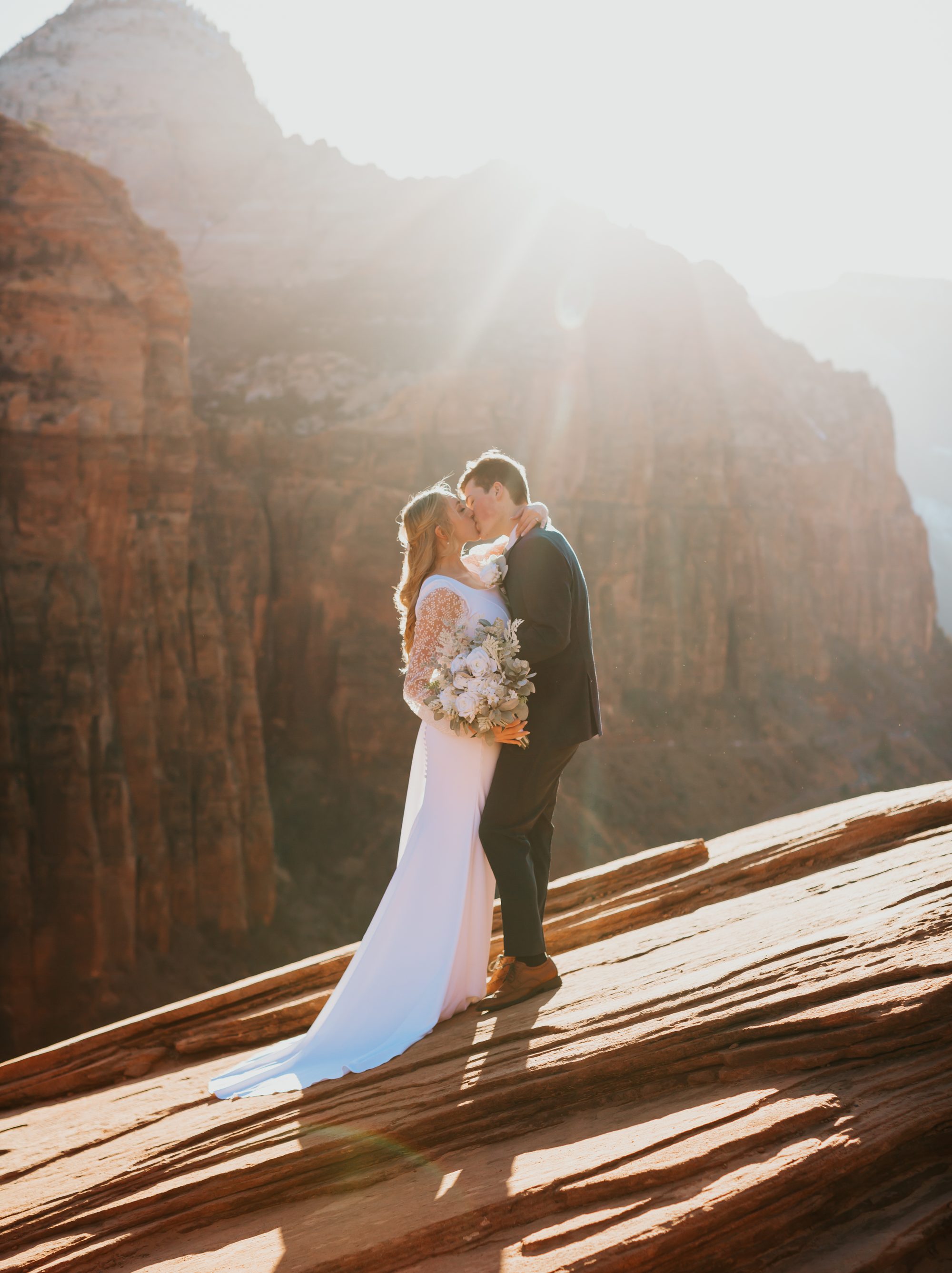 Romantic elopement moment Zion National Park golden hour